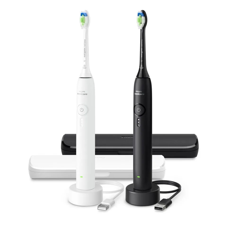 Philips Sonicare 3100 Series eltandborstar i svart och vitt med varsitt reseetui